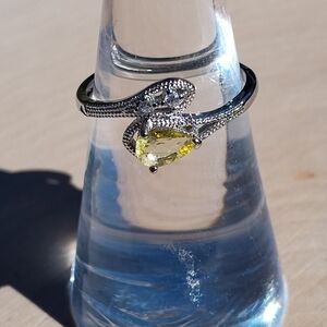Elegant Silver Snake Ring with Yellow Gemstone